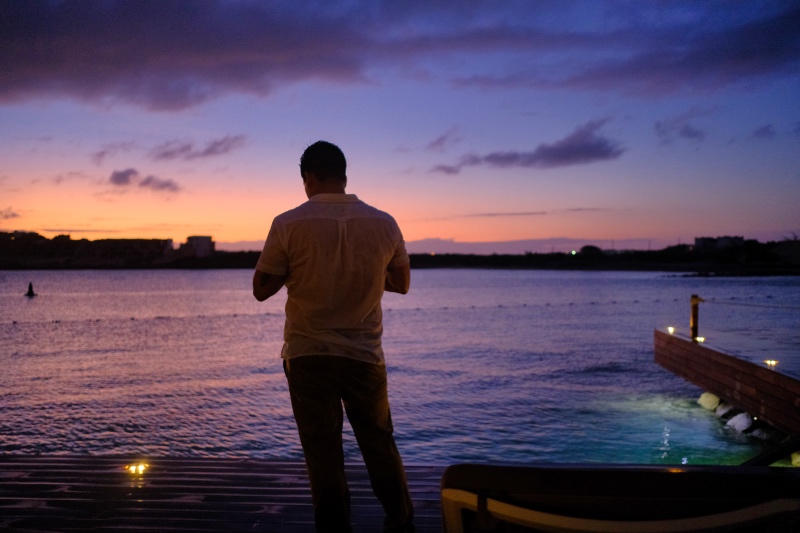 Man looking out to the sea in Turks and Caicos