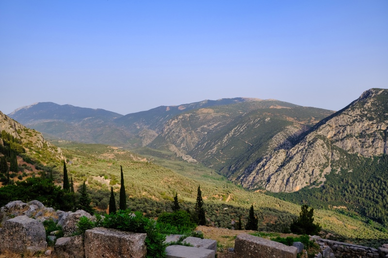 A green valley and mountains surrounding Delphi Greece